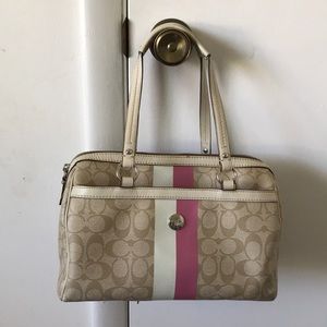 Spring coach purse